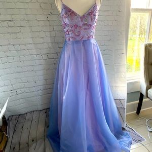 Prom or formal dress never worn. Purple size 4